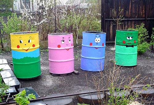 Painted tin barrels in the country